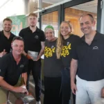 Pacific International Insurance and Soul Hub team members together in Newcastle, supporting the Soft Landings Foundation's community initiatives.
